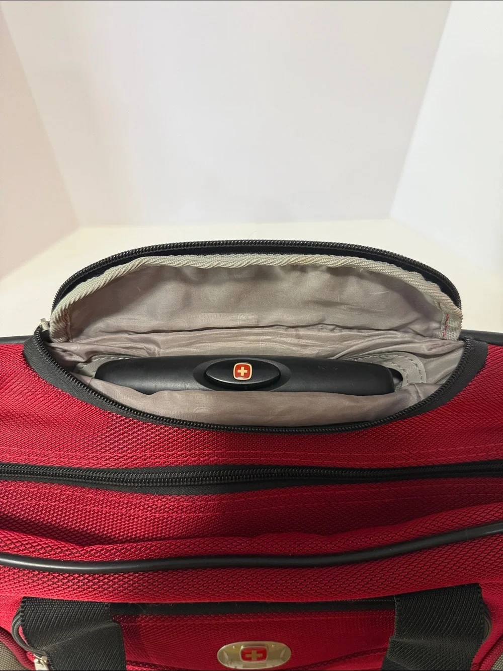 Swiss alps Red Travel Suitcase with Front Pocket and Black Handles